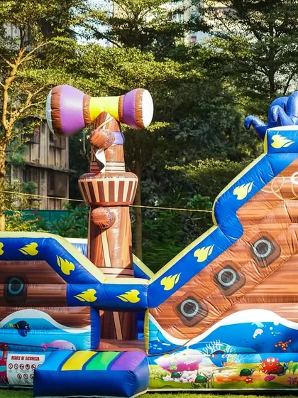 Ahoy, matey! Our pirate ship inflatable is more than just a bouncy castle, it's an adventure zone with slides and climbing areas, perfectly themed for an aquatic or pirate adventure party.