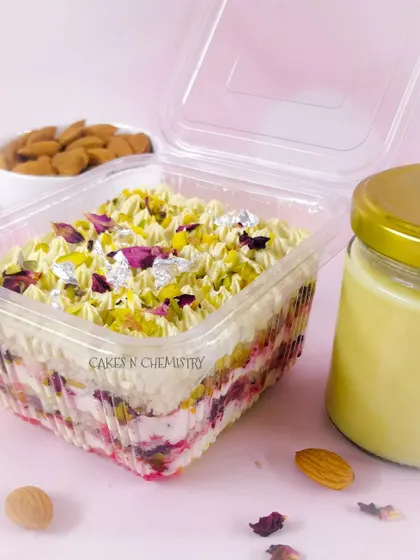 For Holi, I created this Thandai Tres Leches tub cake. It's a light, airy cake soaked in a three-milk mixture infused with traditional thandai spices and topped with pistachios and rose petals.