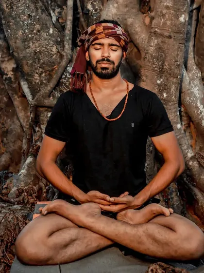Finding a deep state of meditation at the base of an ancient tree. Connecting with nature enhances the practice, grounding my energy and helping me find a profound sense of peace.