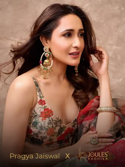 Pragya Jaiswal looking like poetry in motion, adorned with my handcrafted earrings that blend color and tradition.