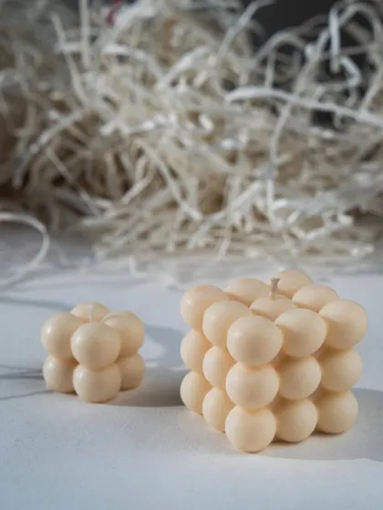 It's time to light up your world. Our website is live with all your favorite candles, like these mini and large bubble candles.