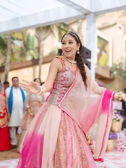 The best moments are the candid ones. This bride's joyful dance at her Mehendi ceremony shows how the makeup I create is not just for pictures. It's lightweight and durable, designed to let you live in the moment and enjoy your celebration to the fullest.