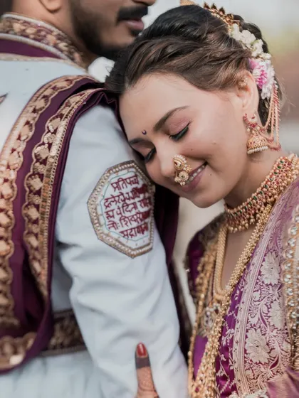 A quiet moment of love. This royal Peshwai bridal look, with intricate jewelry and a soft, romantic makeup palette, is designed to be timeless and unforgettable.