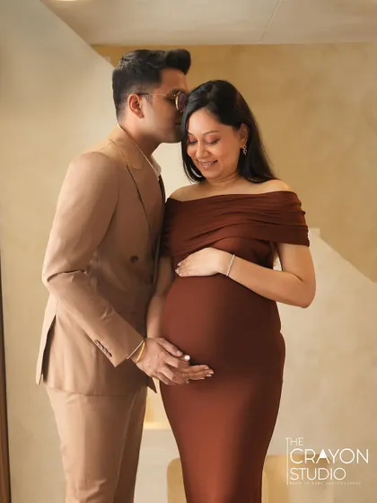 A whispered secret or a gentle kiss on the temple. This close, intimate pose captures the deep and private bond between the couple.
