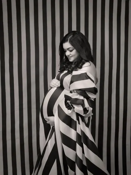 The same iconic striped look, rendered in a classic monochrome filter. This version feels even more timeless and artistic, focusing on the interplay of light, shadow, and pattern.