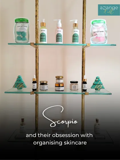 A Scorpio's dream: perfectly organized skincare on elegant glass shelves.