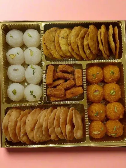 Gifting is made easy with our assorted boxes. This platter features a variety of our bestsellers, including coconut laddoos, boondi laddoos, and savoury mathris for a complete festive treat.