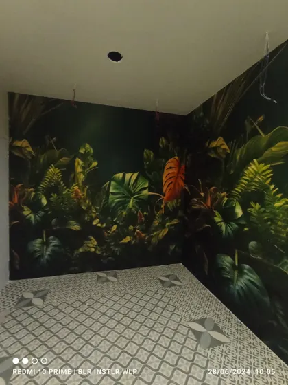 A corner view of the dark tropical mural, showing how I wrap the pattern for a continuous look.