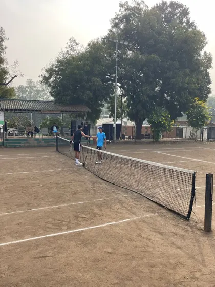 The spirit of competition and sportsmanship on display. A handshake at the net after a tough match during the NPPL league qualifiers in Nashik. We prepare our players for every aspect of competitive tennis.