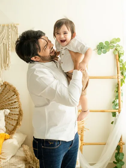 Pure, unrestrained laughter. This is the kind of precious, fleeting moment I aim to freeze in time, a memory of pure happiness for this dad and his boy.