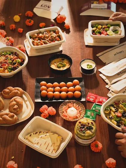 Fuel your party with our delicious and healthy meals. This image shows a beautiful spread of our dishes, perfect for any celebration or gathering.