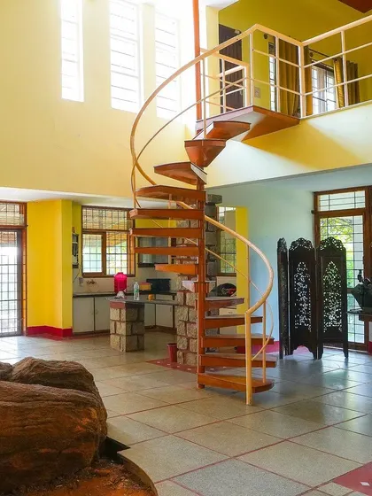 Step inside our luxury villa and discover a world of space and rustic charm. The unique spiral staircase and stone-clad pillars are part of the distinctive architecture that makes your stay special.