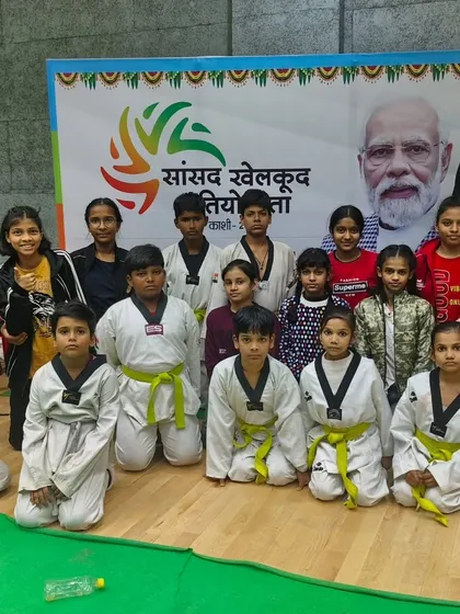 A group of young Taekwondo athletes with their belts, ready to compete. These grassroots tournaments are the first step on a long journey for many aspiring champions.