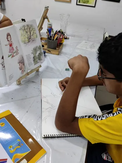 This image shows the initial pencil sketch of the banyan tree, the crucial first step before any paint is applied.