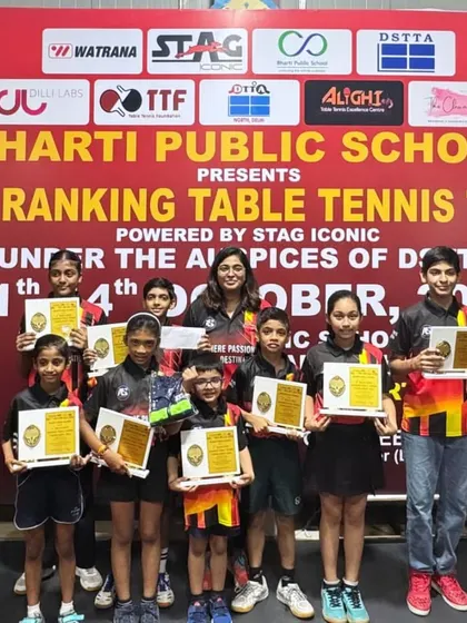 The team of Alightians who performed exceptionally well at the Delhi State Ranking Tournament, posing with their awards.