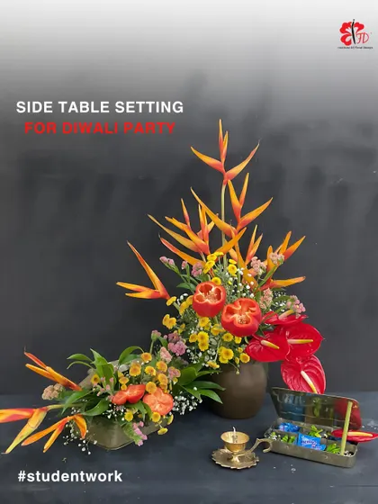 Students learn to create decor for any occasion. This vibrant side table setting for a Diwali party uses birds of paradise and anthuriums to create a dramatic and celebratory floral arrangement.