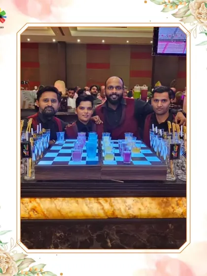 Our bartenders with a creative chessboard shot setup at the Exhibition Centre, adding a fun, interactive element to a corporate event.
