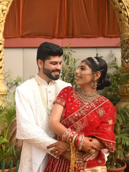 A beautiful moment between the couple. Her soft, subtle makeup ensures she looks like the best version of herself, radiant and in love.