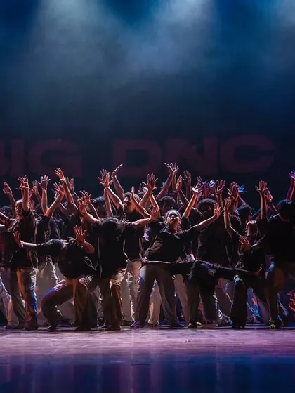 The power of a team. A full-crew shot from a student showcase, where every dancer moves as one. This is what our intensive group training achieves.