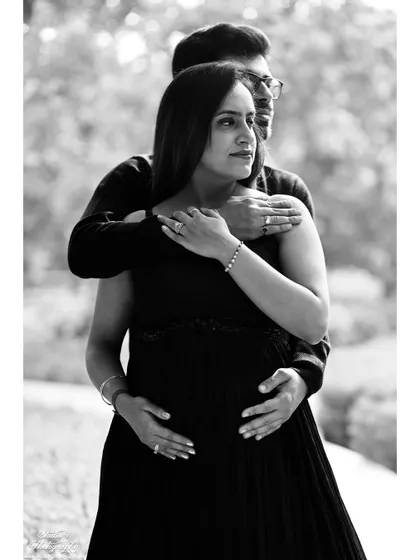 Sometimes, a moment is so timeless it needs no color. This black and white portrait focuses on the intimate embrace and emotion between a couple, creating a classic and powerful photograph.