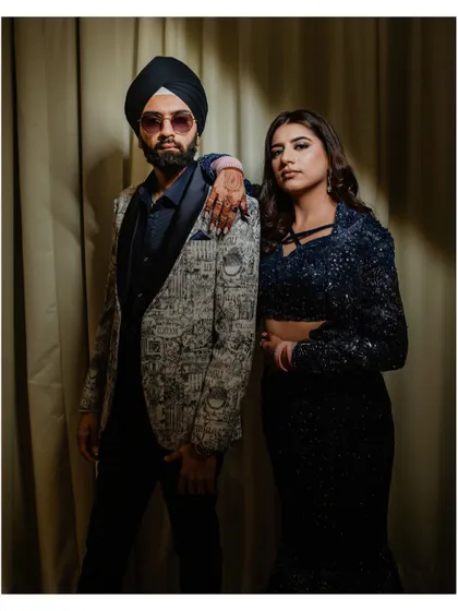 Another chic portrait of the couple, showcasing their undeniable chemistry and style at their cocktail event.
