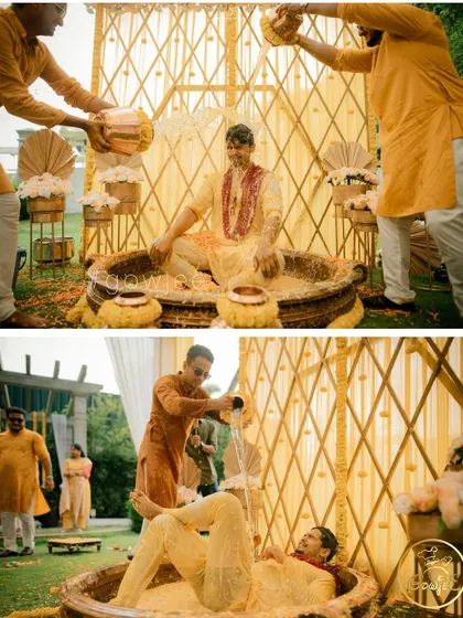 The groom enjoying the playful rituals of the Haldi ceremony in a large traditional vessel.