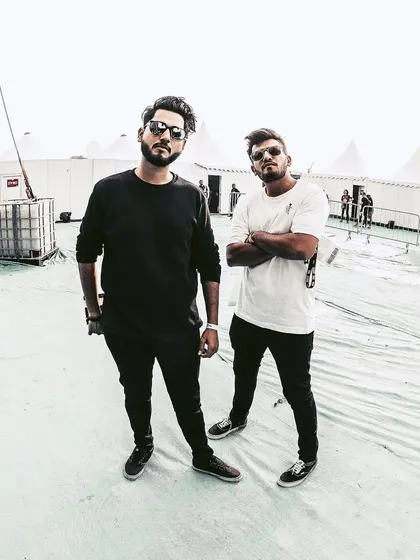 Just a couple of producers about to drop some bomb ass shit. This is us backstage, always plotting our next release.