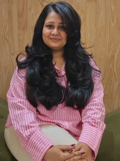 A full view of the beautiful layers and styling. This haircut is perfect for adding body to long hair while maintaining its length, creating a glamorous and healthy look.
