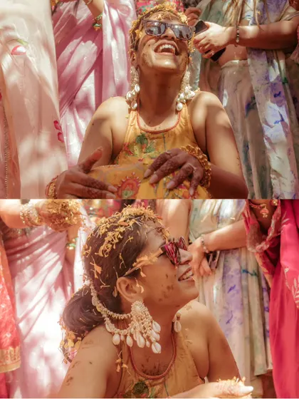 The pure joy on the bride's face says it all. This close-up of Jhalak during her Haldi captures a moment of absolute happiness, surrounded by a flurry of petals and colour.