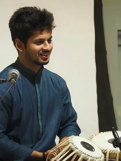 A smile shared with the audience during a lighter moment in my solo. Music is not just serious, it is also about sharing joy.