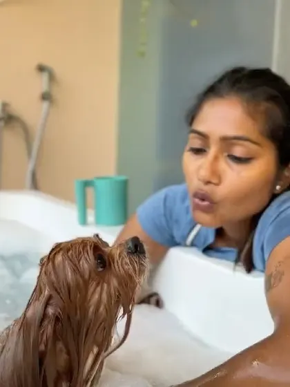 Another angle of me connecting with a sweet dog during their spa treatment. These gentle interactions are key to a positive grooming experience.