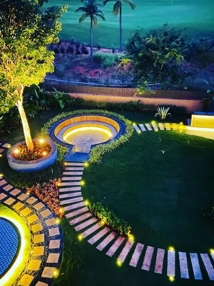 An aerial view showing the intricate layout of the hardscape paths, which create a strong graphic pattern in the landscape.