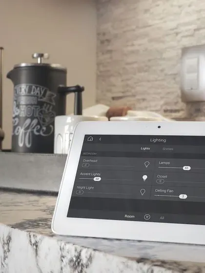 A dedicated touch panel provides a central hub for managing your home's lighting. From this interface, you can adjust brightness levels, control individual lights, and activate different lighting scenes with ease.