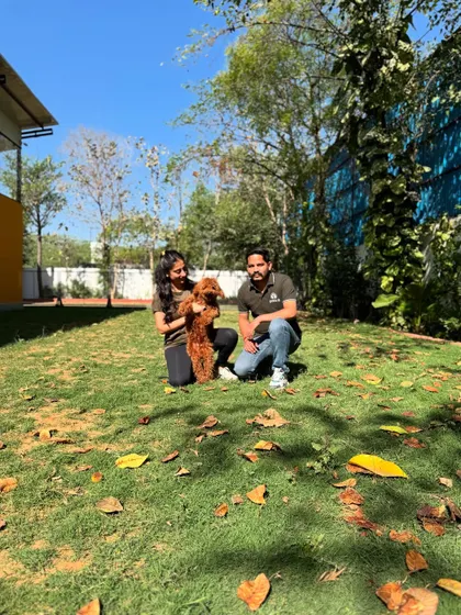 A happy moment with Pablo the poodle in our spacious, leafy yard.
