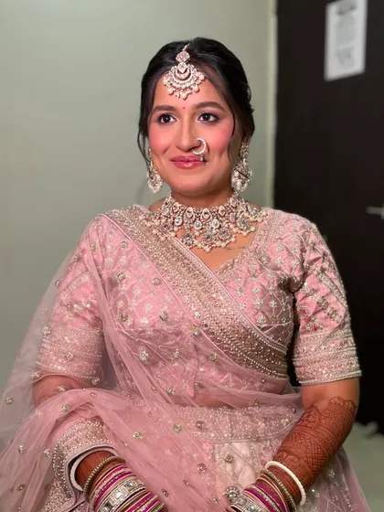 A beautiful portrait of the bride, looking serene and radiant on her wedding day.
