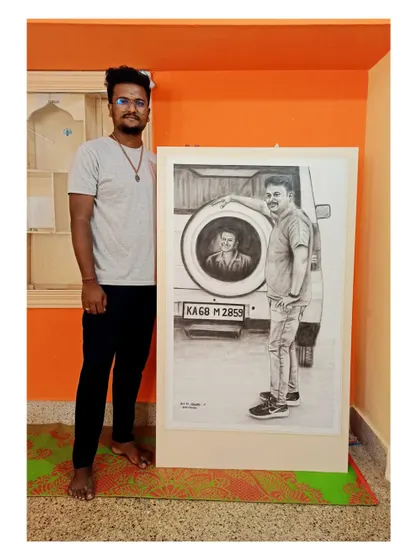 Here I am standing next to a large, completed charcoal portrait before it was delivered to the client. I can work on various scales, from small to life-size.