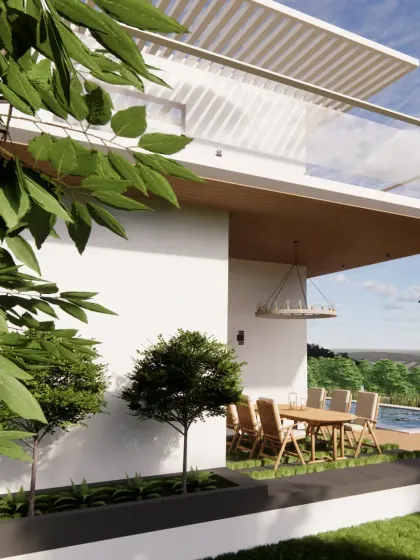 This perspective shows how the villa's outdoor patio and pool area are framed by lush greenery. We carefully planned the landscaping to enhance privacy while maintaining a strong connection between the interior living spaces and the natural surroundings.