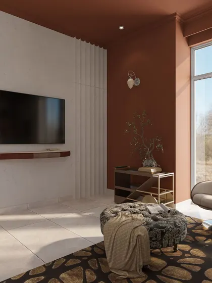 The TV wall in the entertainment room contrasts a textured white panel with the rich rust-colored walls, creating a modern and dynamic focal point.