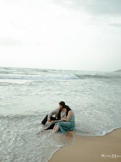 A quiet moment as the waves wash over their feet in Goa. This image captures the peaceful and romantic feeling of being by the sea together.