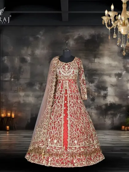 Elegance meets tradition in this red net double tail Indo-Western bridal outfit, designed for the bride seeking timeless sophistication with a Persian twist.