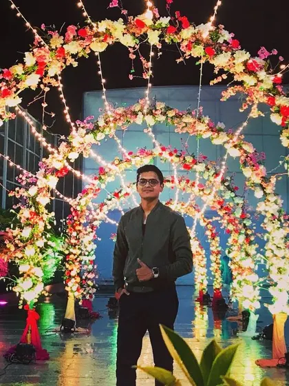 Posing under the beautiful floral decor at The Groves in Bangalore. The ambiance of an event is key, and I love when the decor is as vibrant as the music.