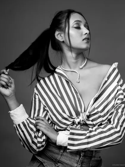 A black and white version of the previous pose, adding a dramatic flair.