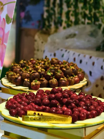 Platters of fresh, seasonal fruits like cherries and mangosteens. We source the best quality produce to offer a refreshing and healthy option for your guests.