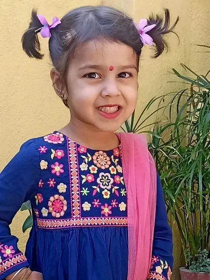 Another portrait of a happy child dressed up for Ugadi.