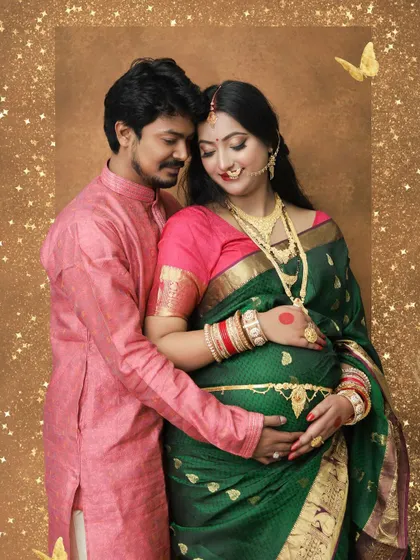 We celebrate love in all its forms, including beautiful traditional attire. This couple's portrait in a stunning green saree and kurta shows how we blend cultural elegance with intimate maternity photography for a truly personal session.