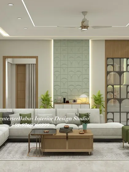 A full view of a 3BHK living room designed with soft pastels and earthy tones. The combination of a light-colored sofa, green ottomans, and wooden furniture creates a refreshing and calming atmosphere. The 3D wall panel and unique display unit add a modern, artistic touch.