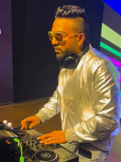 In my shiny disco ball jacket, ready to create the future on the dance floor. It's all about bringing a unique style and energy to every performance.