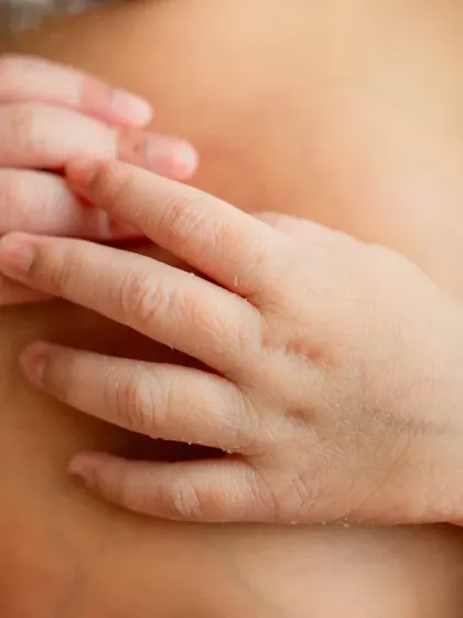 It's all about the tiny details. A close-up of your baby's hands, feet, or delicate features creates a powerful, artistic memory of how small they once were.
