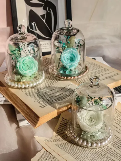 Eternal Roses for eternal love. These preserved roses are set in a beautiful glass cloche and last for 3 to 5 years.