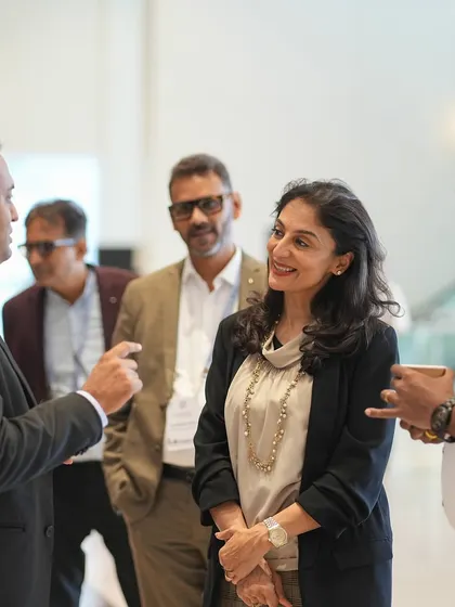 I believe in building partnerships. This image shows me listening to a group of educators at the TAISI conference, learning about their unique challenges and sharing insights on how to foster better parent-teacher communication.